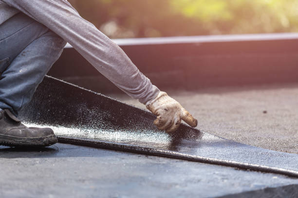 Professional Waterproofing technician working in Rainbow City, AL